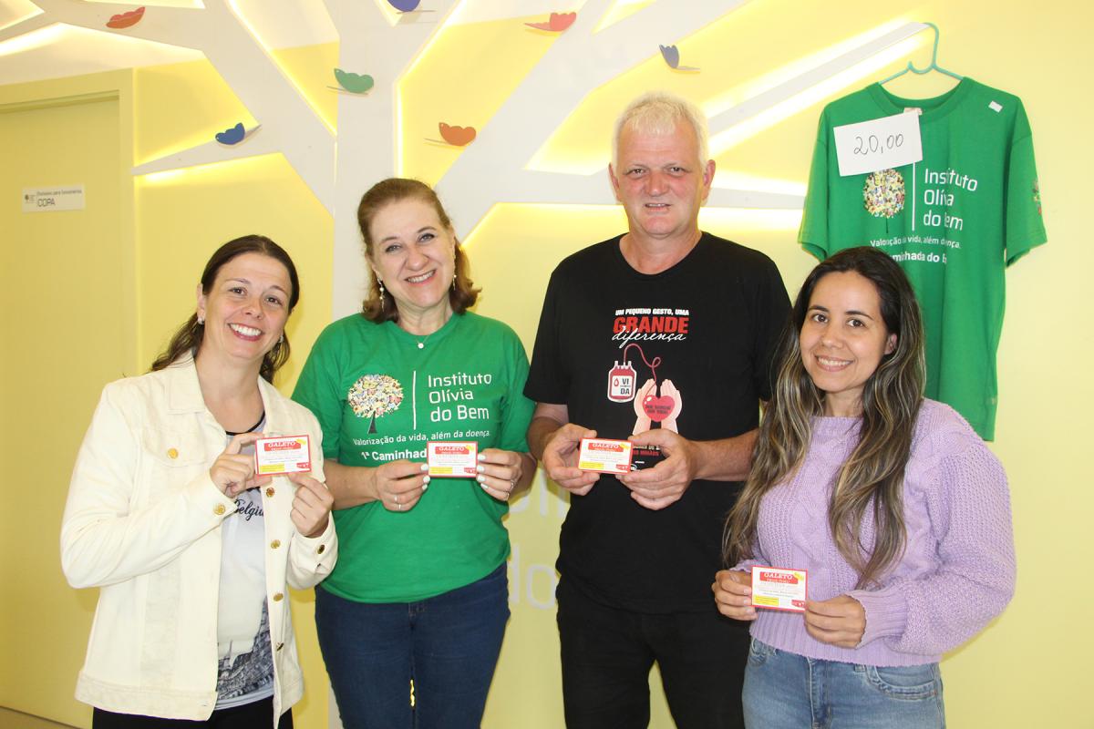 Psicológa Lizandra Loureiro, presidente Luciana Lemos, coordenador dos Doadores de Sangue Sérgio Kroetz e estagiária em psicologia Márcia Cibelly Pires convidam a todos para prestigiar o galeto