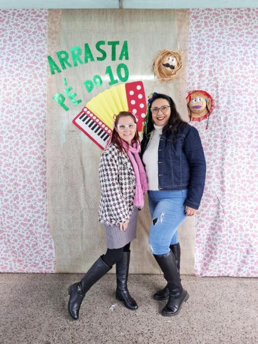 Carine e a atual diretora Helen